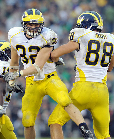 Jordan Kovacs (32) and Craig Roh (88)