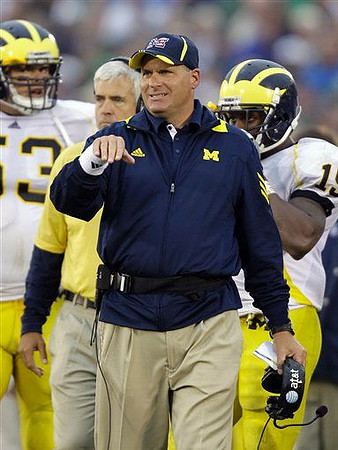 Ryan Van Bergen (53), Greg Robinson, Rich Rodriguez, and Thomas Gordon (15)