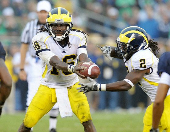 Denard Robinson (16) and Vincent Smith (2)