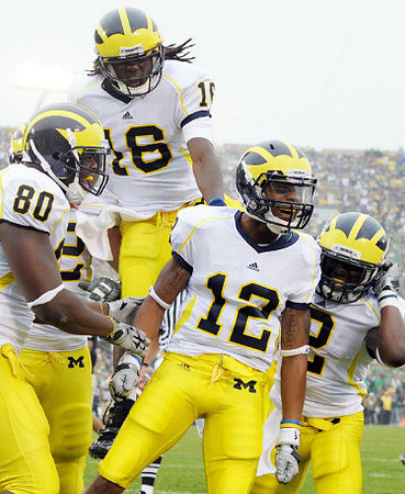Martell Webb (80), Denard Robinson (16), Roy Roundtree (12), and Vincent Smith (2)