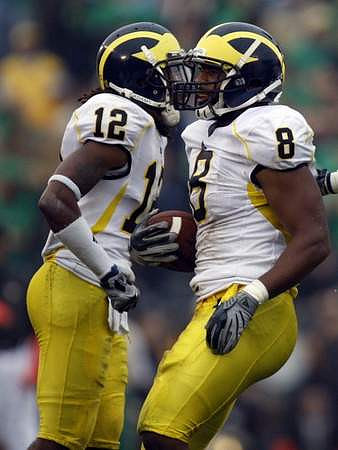 J.T. Floyd (12) and Jonas Mouton (8)
