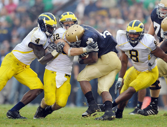 Cameron Gordon (4), Jordan Kovacs (32), and Jonas Mouton (8)