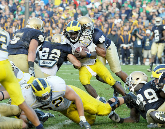 Patrick Omameh (65), Stephen Schilling (52), and Denard Robinson (16)
