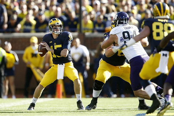 Jake Rudock (15), Graham Glasgow (61), and Jake Butt (88)