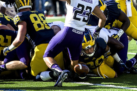 Jake Butt (88), Drake Johnson (20), and A.J. Williams (84)