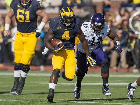 Graham Glasgow (61) and De'Veon Smith (4)