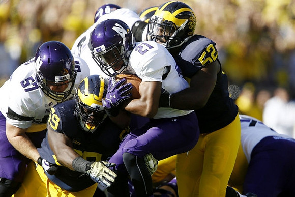Willie Henry (69) and Royce Jenkins-Stone (52)