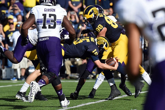 Jake Rudock (15) and Jake Butt (88)