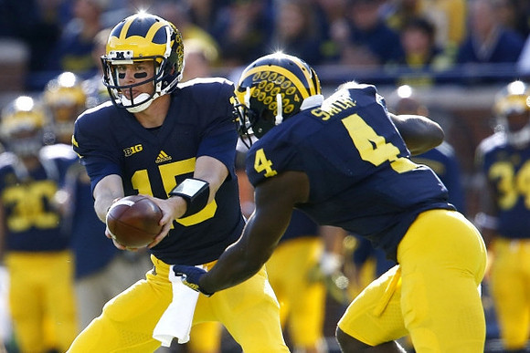 Jake Rudock (15) and De'Veon Smith (4)