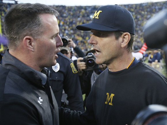 Northwestern Head Coach Pat Fitzgerald and Jim Harbaugh