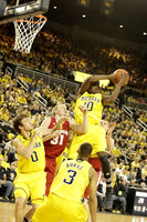 Zack Novak (0), Trey Burke (3), and Tim Hardaway Jr. (10)