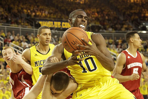 Jordan Morgan (52) and Tim Hardaway Jr. (10)