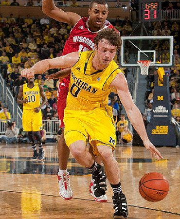 Tim Hardaway Jr. (10) and Zack Novak (0)