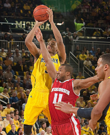 Trey Burke (3) and Jordan Morgan (52)