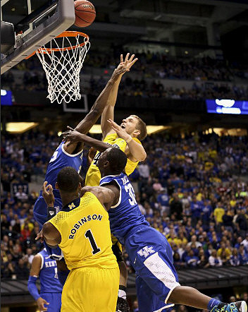 Glenn Robinson III (1) and Nik Stauskas (11)