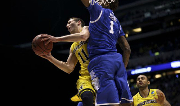Nik Stauskas (11) and Jon Horford (15)