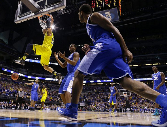 Caris LeVert (23) and Jordan Morgan (52)