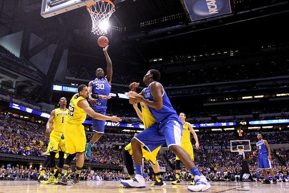 Glenn Robinson III (1), Jordan Morgan (52), and Nik Stauskas (11)