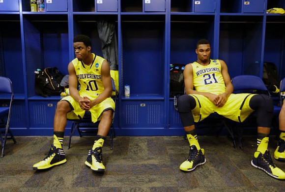 Derrick Walton Jr. (10) and Zak Irvin (21)