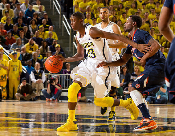 Caris LeVert (23) and Jon Horford (15)