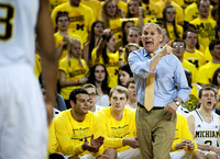 Josh Bartelstein (20),Blake McLimans (22), John Beilein, and Spike Albrecht (2)