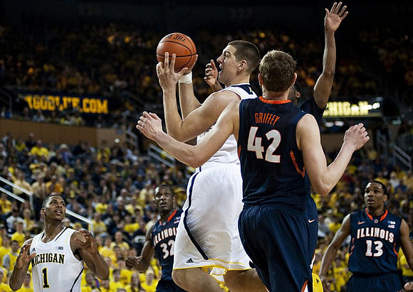 Glenn Robinson III (1) and Mitch McGary (4)