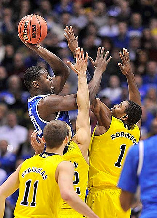 Nik Stauskas (11), Jordan Morgan (52), and Glenn Robinson III (1)