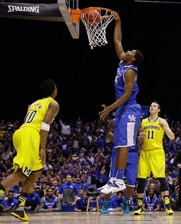 Derrick Walton Jr. (10) and Nik Stauskas (11)