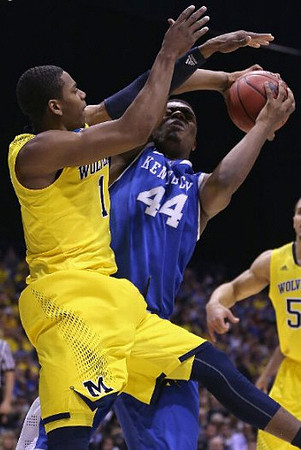 Glenn Robinson III (1) and Jordan Morgan (52)