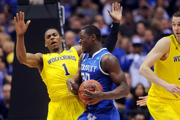 Glenn Robinson III (1) and Nik Stauskas (11)