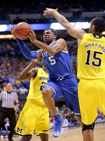 Caris LeVert (23) and Jon Horford (15)
