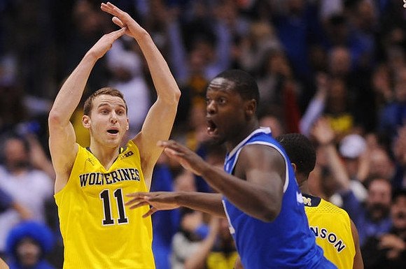 Nik Stauskas (11) and Glenn Robinson III (1)