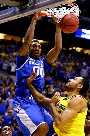 Derrick Walton Jr. (10) and Jon Horford (15)
