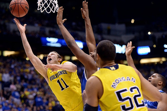 Nik Stauskas (11) and Jordan Morgan (52)