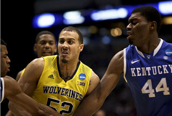 Jordan Morgan (52) and Glenn Robinson III (1)