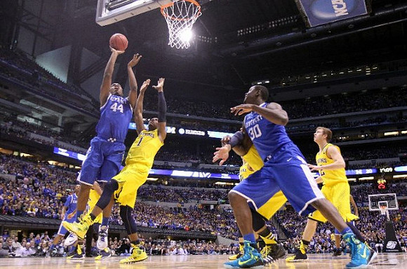 Glenn Robinson III (1) and Spike Albrecht (2)