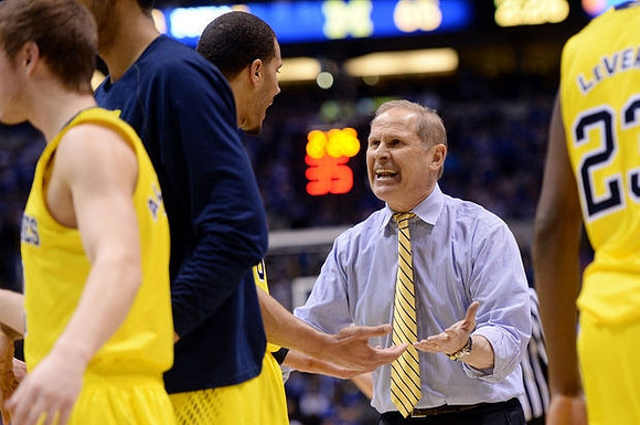 Jordan Morgan (52) and John Beilein
