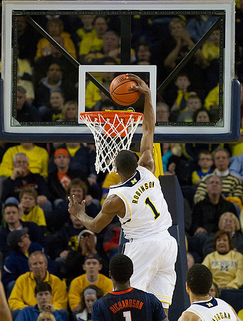Glenn Robinson III (1) and Jordan Morgan (52)