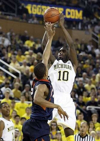 Tim Hardaway Jr. (10) and Glenn Robinson III (1)