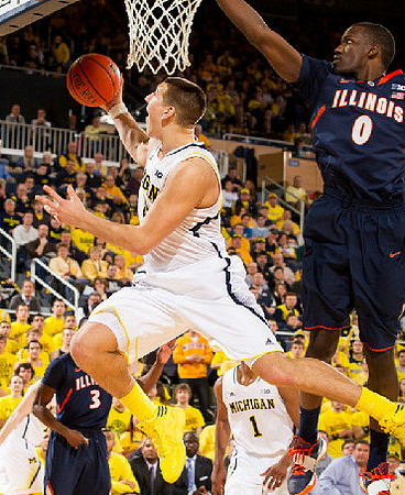 Mitch McGary (4) and Glenn Robinson III (1)