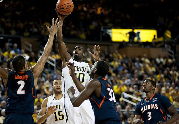 Jon Horford (15) and Tim Hardaway Jr. (10)
