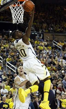 Tim Hardaway Jr. (10) and Mitch McGary (4)