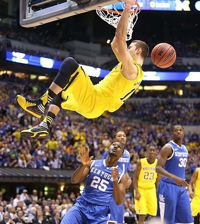 Nik Stauskas (11) and Caris LeVert (23)