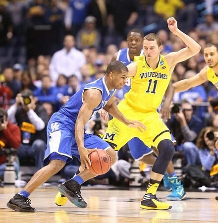 Nik Stauskas (11) and Jordan Morgan (52)