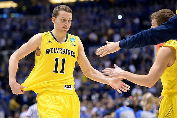 Nik Stauskas (11) and Spike Albrecht (2)