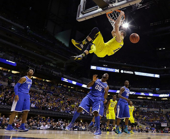 Nik Stauskas (11), Caris LeVert (23), and Glenn Robinson III (1)
