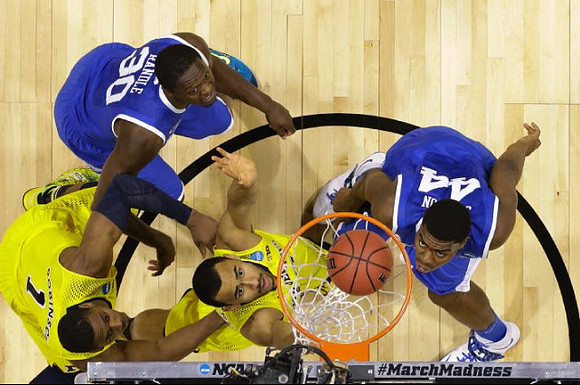 Glenn Robinson III (1) and Jon Horford (15)