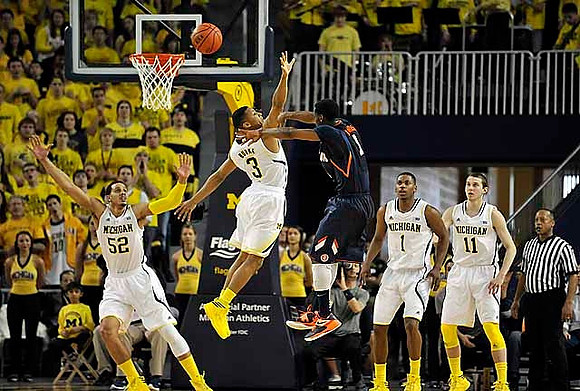 Jordan Morgan (52), Trey Burke (3), Glenn Robinson III (1), and Nik Stauskas (11)