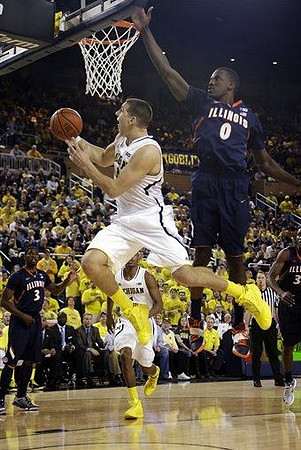 Mitch McGary (4) and Glenn Robinson III (1)