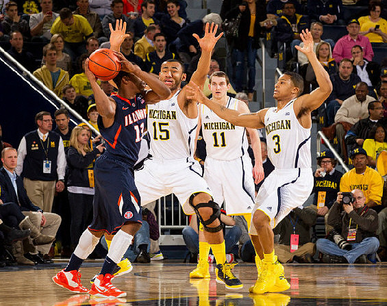 Jon Horford (15), Nik Stauskas (11), and Trey Burke (3)